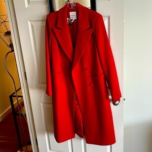 Lined red wool double breasted coat. Dress it up on down! Great statement jacket